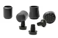 Side view of seven black rubber chair feet of different styles.