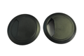 Pair of black plastic desk grommets with no background.