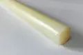 A Solid, round, nylon rod, natural coloured.