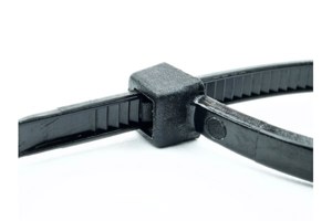 Close up of ratchet mechanism of black nylon cable tie.