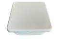 Angled view of a white plastic square tube insert.