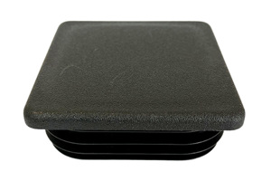 Angled view of a black plastic square tube insert.