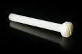 A Nylon bolt with a slotted hex head.