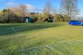 Turf mesh installed at a sports club overflow car park