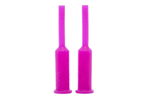 Two pink silicone plugs. With a tapered step in the middle and a small flange at the larger end.