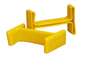 Pair of yellow pvc i shaped protection caps on white background.