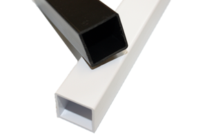A close up of Two extruded plastic square tubes, in black and white. One laying across the other.