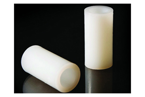 Two cylindrical nylon spacers