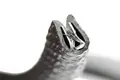 Close up metal lined rubber edging strip.