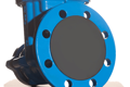 Blue painted metal flange for water pump with rubber protection disc fitted.