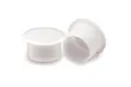 Two natural coloured plastic barrel plugs at different angles.