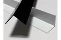 Two extruded right angle plastic profile. Laying across each other in a cross. One in black and one in white.