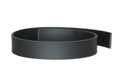 A flexible, flat, plastic extruded profile in black. Being spiralled round on it's self.
