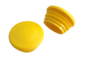 Top and side view of round plastic tube insert made from yellow plastic.