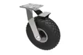 Castor with a black rubber pneumatic wheel with a metal swivel bracket and integrated brake.