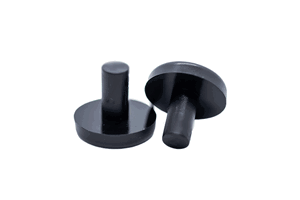 Two Black, plastic stacking chair buffers. One standing up and one on it's side.