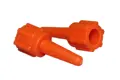 Two orange plastic collar plugs. Both on their sides pointing opposite directions.