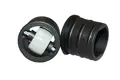Two black plastic, round tube inserts. With an small, grey, internal castor wheel. Laying down on their sides.