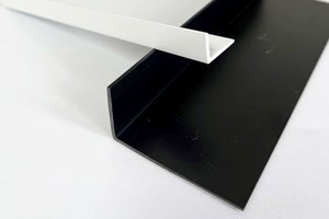 Two extruded right angle profiles, with different length sides. In black and white.