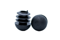 Two black plastic round tube inserts with a domed top. One standing up and one on its side, facing the camera.