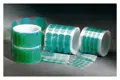 Three rolls of Green Polyester masking discs, in different diameters.
