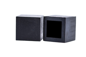 Side-by-side view of two square injection moulded chair feet with a thick wall and flat base.