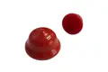 Two red vinyl plugs. In descending size left to right. One standing, one on its side.