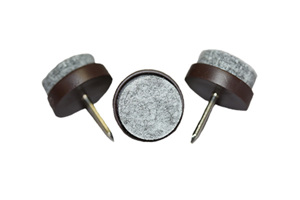 Three nail in feet. Grey felt on brown plastic base with metal nail.