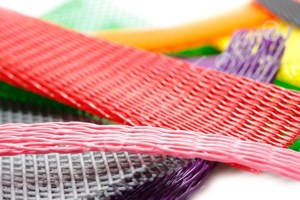 A selection of plastic protecting netting. In various sizes. Pink, Purple, Orange, Red, Yellow and Green.