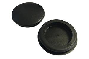 Two black flexible rubber blanking plugs on white background.