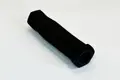 Diagonal view of a black high density foam extrusion moulded grip-sleeve with a plastic end cap.