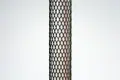 Black plastic protective netting, stretched over a tube.